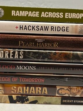Stack of Assorted Movie DVD Spine Decor in Brown, Black, White